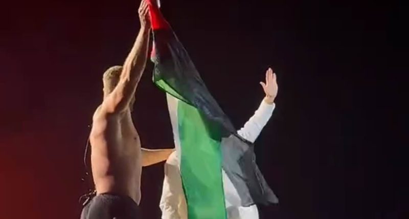 Rock band sparks major backlash after waving Palestinian flag on stage