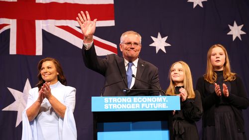 Prime Minister of Australia Scott Morrison, flanked by his wife Jenny Morrison and daughters Lily Morrison and Abbey Morrison concedes defeat following the results of the Federal Election during the Liberal Party election night event at the Fullerton Hotel on May 21, 2022 in Sydney, Australia.