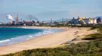 A search is underway for a 78-year-old man who was thrown into the sea after his boat capsized south of Sydney.