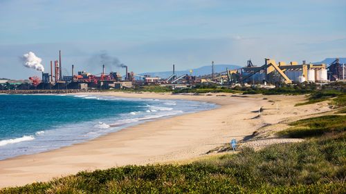 A search is underway for a 78-year-old man who was thrown into the sea after his boat capsized south of Sydney.
