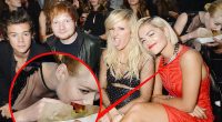 She's hungry for something! Iggy Azalea strikes up banter with Harry Styles after she's caught chowing down buffalo wings behind him in VMAs snap