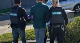 The southwest Sydney man was arrested and faces human trafficking charges.