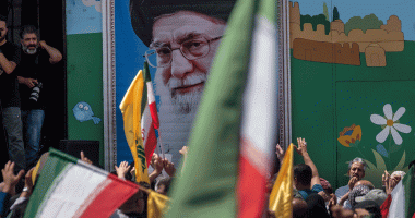 Supreme Leader Ayatollah Ali Khamenei image on the wall during a pro-Iran demonstration