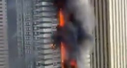 Fire engulfing a Dubai Marina skyscraper; 3,820 evacuated.