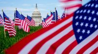 The U.S. Capitol is seen past American flags on the National Mall, Friday, June 6, 2025, on the National Mall in Washington. (AP Photo/Julia Demaree Nikhinson)