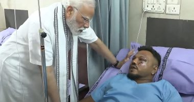 Prime Minister Narendra Modi visiting the sole survivor of the Air India flight 171 crash in a hospital.