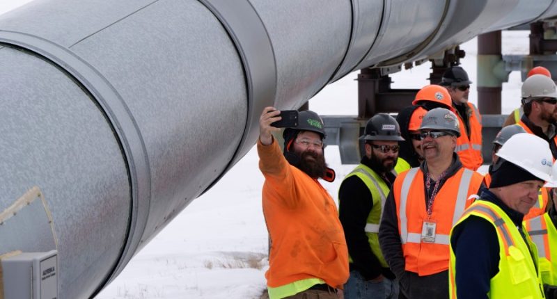 Top Trump officials visit prolific Alaska oil field amid push to expand drilling