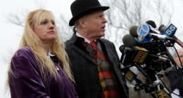 Mari Gilbert and her lawyer speaking at a news conference.