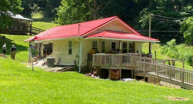 Tree trunk plows into Carter County home