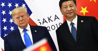 Photo of Donald Trump and Xi Jinping standing together.