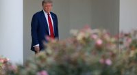 President Donald Trump walks out of the Oval Office and views the Rose Garden construction before boarding Marine One on the South Lawn of the White House on Friday, June 20, in Washington, DC.