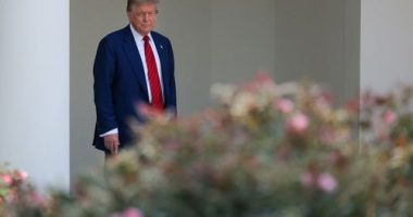 President Donald Trump walks out of the Oval Office and views the Rose Garden construction before boarding Marine One on the South Lawn of the White House on Friday, June 20, in Washington, DC.
