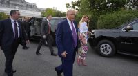 President Donald Trump and first lady Melania Trump walk after greeting guests during the congressional picnic on the South Lawn of the White House, Thursday, June 12, 2025, in Washington. (AP Photo/Alex Brandon)
