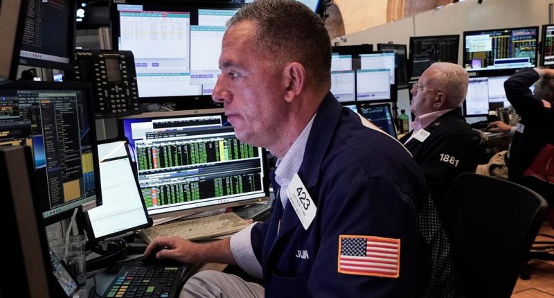 US stocks hit record highs amid trade policy concerns