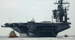 USS Nimitz carrier strike group sailing toward Middle East ahead of schedule, US official says