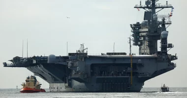 USS Nimitz carrier strike group sailing toward Middle East ahead of schedule, US official says