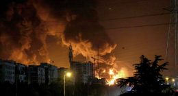 A fire blazes in the oil depots of Shahran, northwest of Tehran