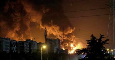 A fire blazes in the oil depots of Shahran, northwest of Tehran