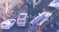 A woman was unable to be revived after being pulled from a burning unit in Cremorne.