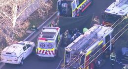 A woman was unable to be revived after being pulled from a burning unit in Cremorne.