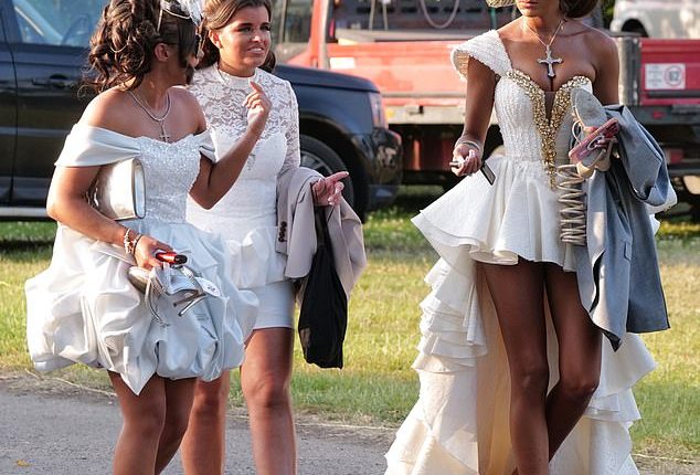 A group of glamorous racegoers swap their high heels for flip flops as they leave Ladies Day at Ascot