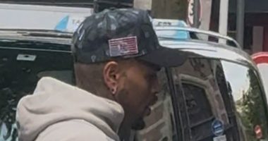 Chris Brown emerges in Amsterdam as he prepares to take to the stage for his first concert since being released on £5million bail over alleged nightclub bottle attack