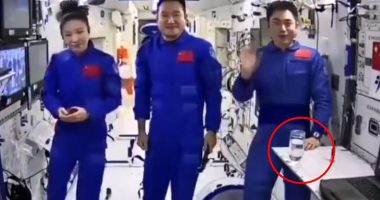 Conspiracy theories ignite online as China posts a video of a glass of water on the Tiangong Space Station - as sceptics claim it seems 'fully subjected to gravity'