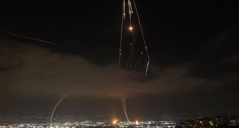 Expert reveals how Iran's missiles may have been hacked mid-flight over Israel and sent plunging into the Mediterranean Sea
