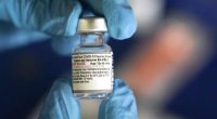 FDA requires updated warning about rare heart risk with COVID shots