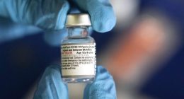 FDA requires updated warning about rare heart risk with COVID shots