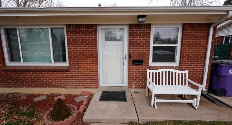 FILE - The residence where a former funeral home owner kept a deceased women's body in a hearse for two years as well as the remains of 30 cremated people is shown Friday, Feb. 16, 2024, in southwest Denver. Miles Harford, a former funeral home owner accused of hiding a woman's corpse in the back of a hearse for two years and hoarding the cremated remains of at least 30 people, was arrested Thursday night, Feb. 22, 2024, authorities said. (AP Photo/David Zalubowski, File(