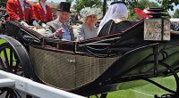King Charles III and Queen Camilla arrive at Royal Ascot in horse-drawn carriages that travel along the track and into the Parade Ring