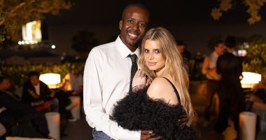 Jessica Simpson models a silk nightie minidress as she cuddles Vas J Morgan... after leaving husband