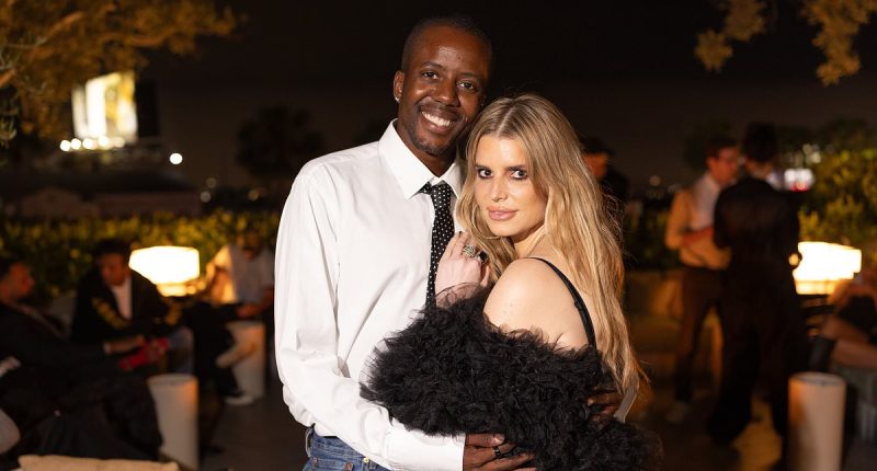 Jessica Simpson models a silk nightie minidress as she cuddles Vas J Morgan... after leaving husband