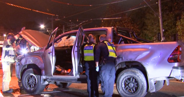 Man arrested, woman flees after car smashes into tram stop