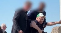 Martin Odegaard's wedding descends into chaos as photographer is dragged AWAY by security guards - while Arsenal star marries Helene Spilling