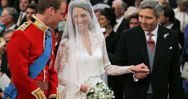 Michael Middleton, the father of Catherine, the Princess of Wales, is pictured with his daughter and son-in-law on their wedding day in April 2011