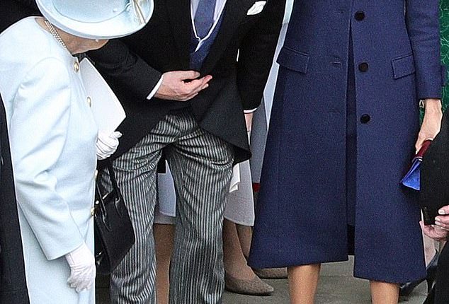 In a moment captured on camera, the late Queen Elizabeth is seen leading the family out of St George's Chapel and instructing them to move down from the doorway