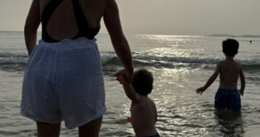 Princess Eugenie shared a photograph of herself at the beach with her sons August and Ernest for World Ocean Day on Sunday (pictured from L to R: Eugenie, Ernest, August)