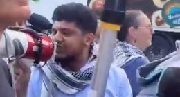 Pro-Palestinian activist who avoided prosecution after chanting 'I love the 7th of October' is Islamist refugee granted asylum in Britain