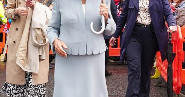 The Queen (pictured) has braved the rainy weather to visit what she called 'the most beautiful racecourse' and open a new stand that has been named in her honour today