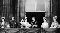 The Royal Family wave from the balcony of Buckingham Palace during King George VI and Queen Elizabeth's silver wedding anniversary. The royal fans were somewhat over-enthusiastic and cheered the royals to come out nine times