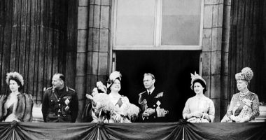 The Royal Family wave from the balcony of Buckingham Palace during King George VI and Queen Elizabeth's silver wedding anniversary. The royal fans were somewhat over-enthusiastic and cheered the royals to come out nine times