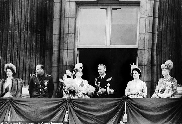 The Royal Family wave from the balcony of Buckingham Palace during King George VI and Queen Elizabeth's silver wedding anniversary. The royal fans were somewhat over-enthusiastic and cheered the royals to come out nine times