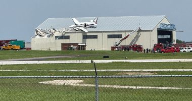 Small plane crashes onto hangar roof at Kansas airport