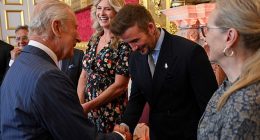 The King shakes hands with David Beckham next to Penny Lancaster and Meryl Streep