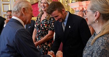 The King shakes hands with David Beckham next to Penny Lancaster and Meryl Streep