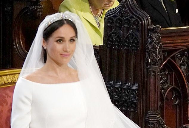 Prince Philip watches Meghan Markle during her wedding to Prince Harry in 2018. Philip was reportedly left 'very disappointed' in Meghan for not following his example