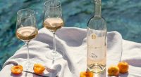 The glossy announcement, which was shared via the official As Ever Instagram account, came with a sun-drenched image of a bottle elegantly styled poolside, flanked by two glasses and ripe apricots