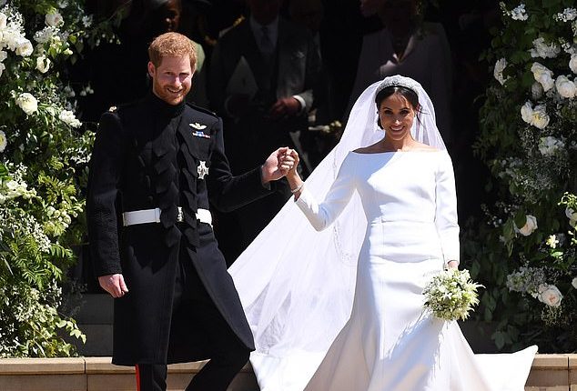 Prince Harry and Meghan Markle leave St George's Chapel as the newly minted Duke and Duchess of Sussex in May 2018